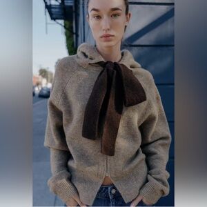 ZARA Cardigan with hoodie and contrasting bow. Long sleeves Front zip closure